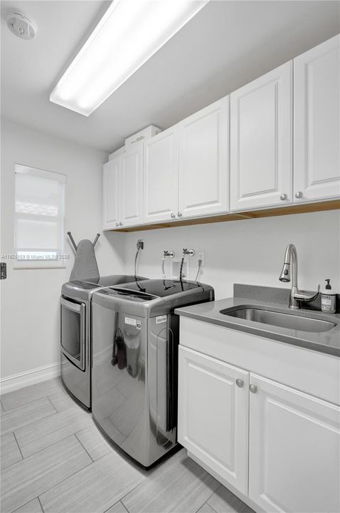 Separate air conditioned laundry.