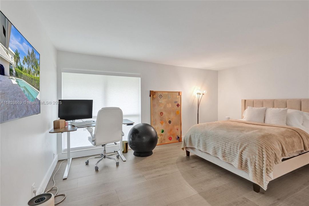 Spacious third bedroom offering comfort and versatility, ideal for family, guests, or a personalized retreat.