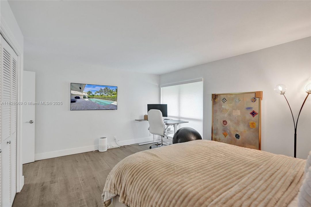 Spacious third bedroom offering comfort and versatility, ideal for family, guests, or a personalized retreat.