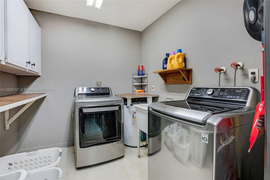 Laundry with utility tub and storage