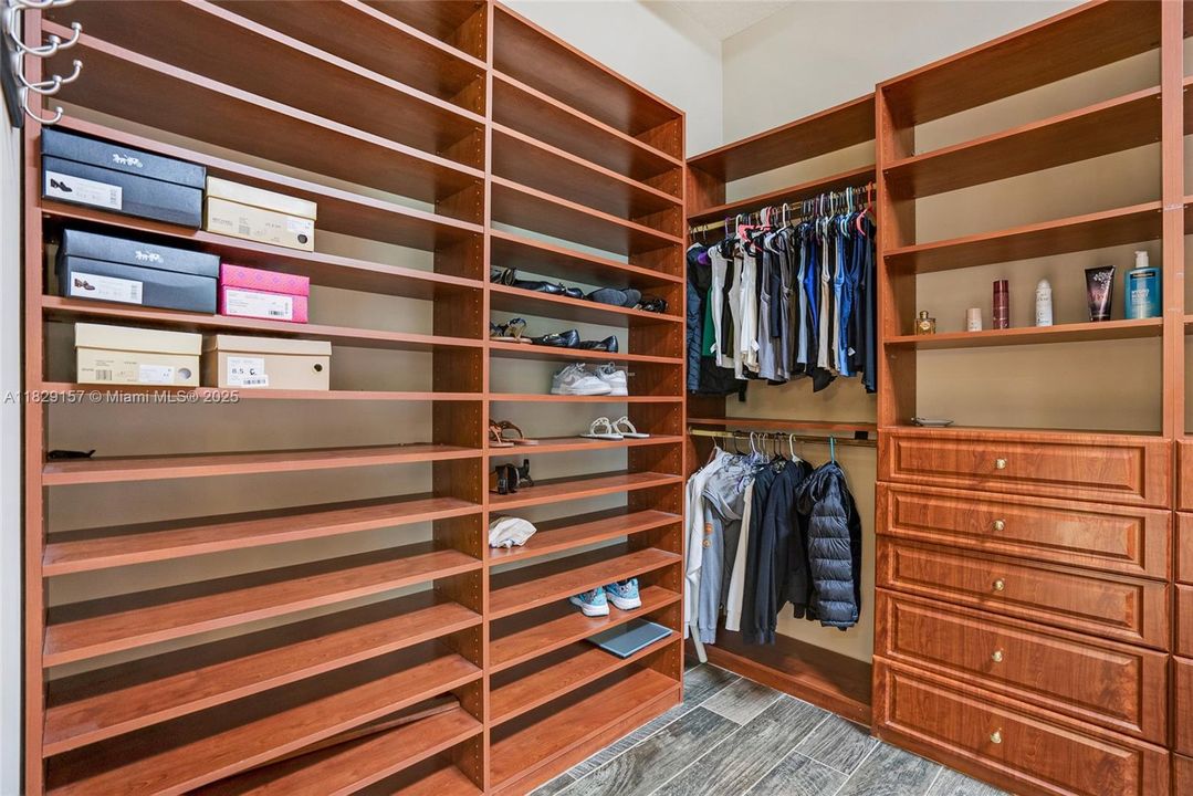 Massive His & Hers walk-in closets