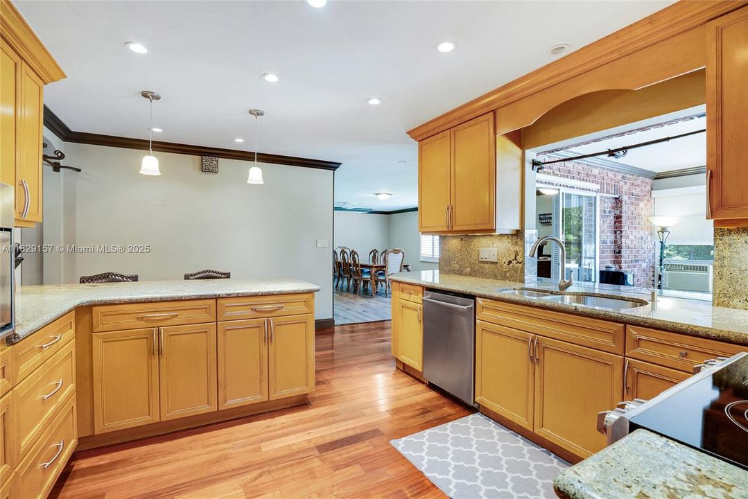 Kitchen has pass through to Florida Room