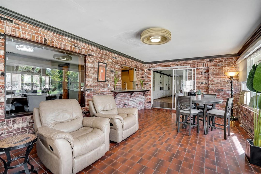 Florida opens to the dining and kitchen area