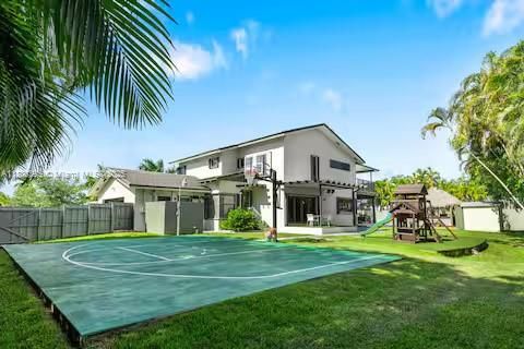 Modern family estate with full-size basketball court!