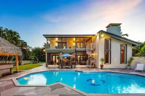 Luxury home with infinity-edge pool and tiki cabana!