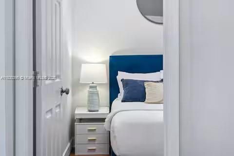 Intimate bedroom retreat with navy nautical vibes!