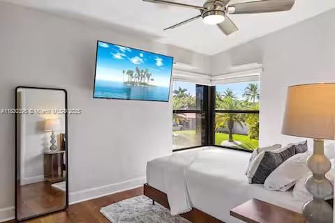 Corner bedroom sanctuary with tropical window frames!