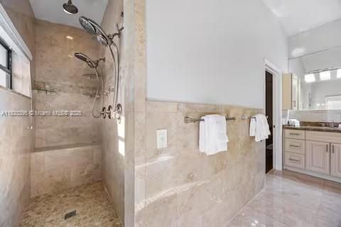Walk-through shower with travertine tile luxury!