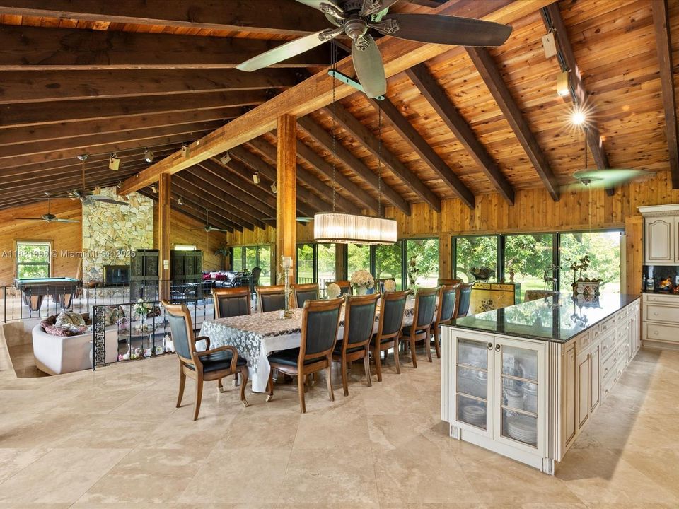 Views of the Kitchen, Dining Room, Living Room & Family Room.