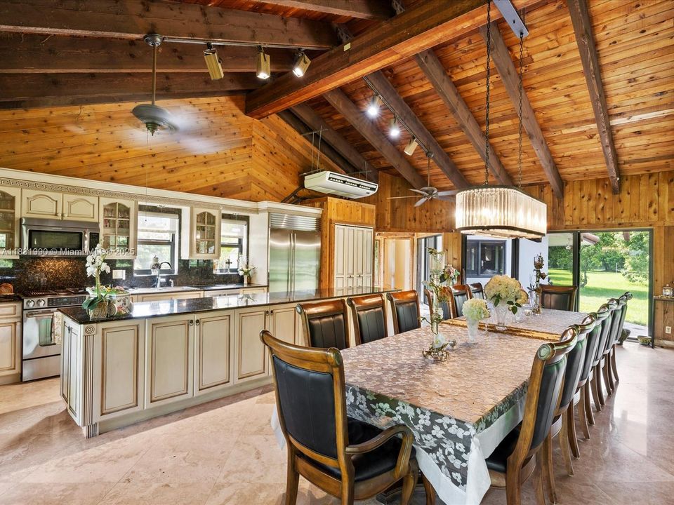Views of the Dining room and Kitchen.