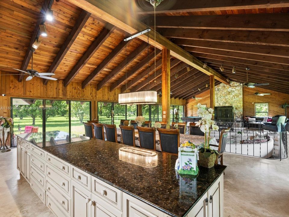 Views of the Kitchen, Dining Room and Living Room.