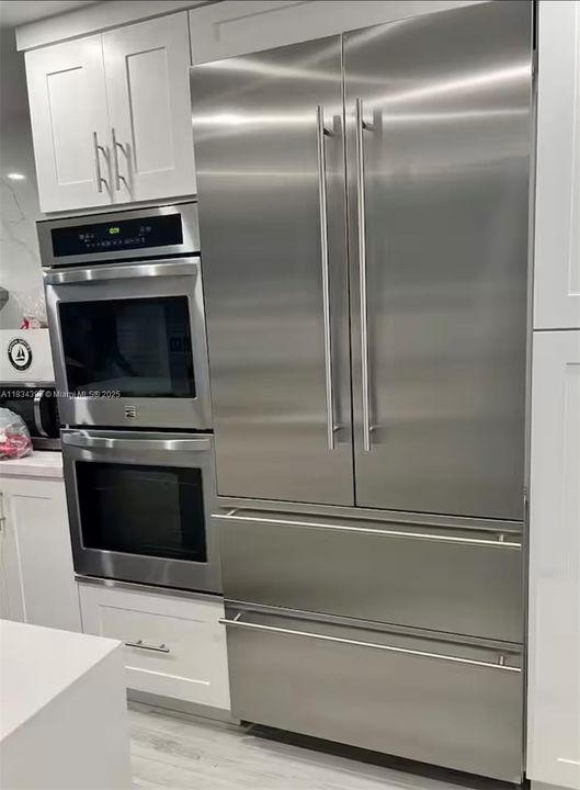 Kitchen with Luxury Appliances which include this amazing Liebherr Refrigerator