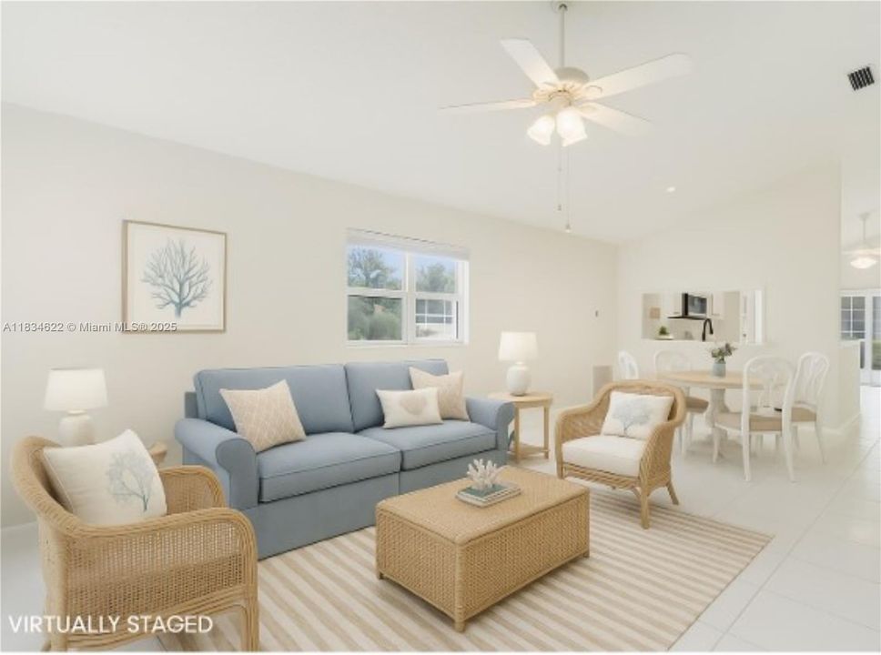 Open living/dining area staged