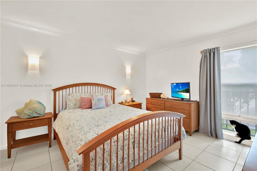 Bedroom with wall sconces