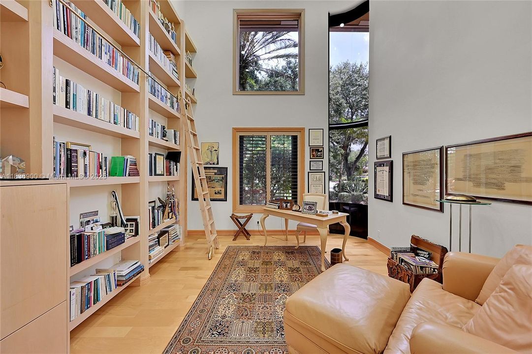 The Owners Favorite Room with the convenience of a sliding ladder for the 16' of shelves!