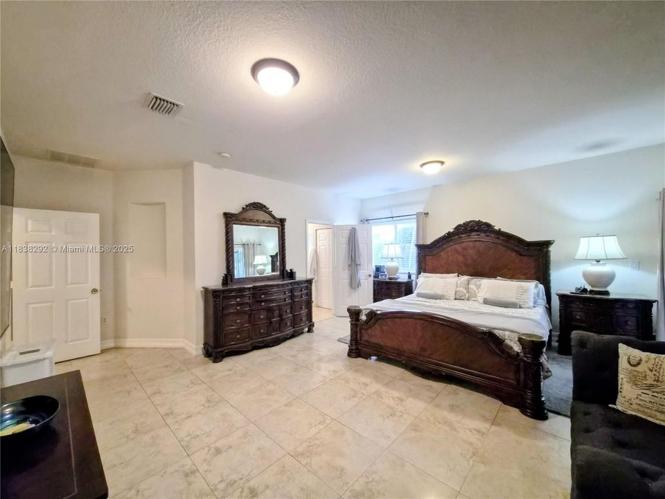 Primary Bedroom: Approx Measurements : 19.1' X 20.0' + 2 generous -walk-in closets each 7.4' x7.11' & 7.4' x 8.00'