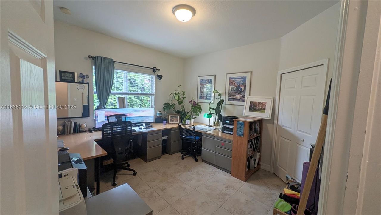 bedroom 2 Approx Measurements 12 x 12.2 +huge walk-in closet 7.7 x 6.11- currently being used as an office