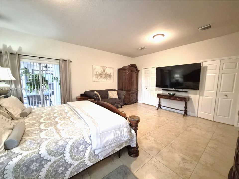 Primary Bedroom: Approx Measurements : 19.1' X 20.0' + 2 generous -walk-in closets each 7.4' x7.11' & 7.4' x 8.00'