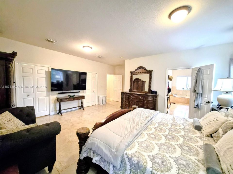 Primary Bedroom: Approx Measurements : 19.1' X 20.0' + 2 generous -walk-in closets each 7.4' x7.11' & 7.4' x 8.00'