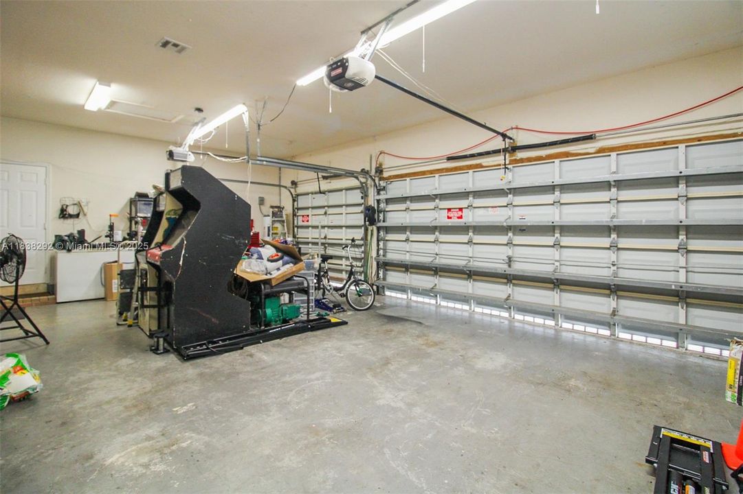 THREE CAR GARAGE WITH 2 Window- can easly be turned into an apartment: approx measurements: 29.11 x 20.1