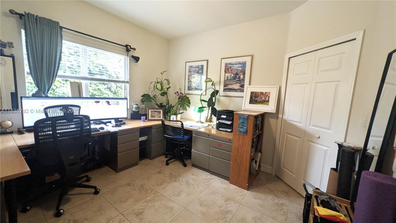 bedroom 2 Approx Measurements 12 x 12.2 +huge walk-in -currently being used as an officecloset 7.7 x 6.11