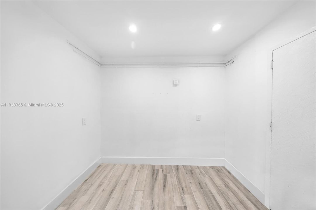 Additional space ideal for a home office, guest room or pantry.