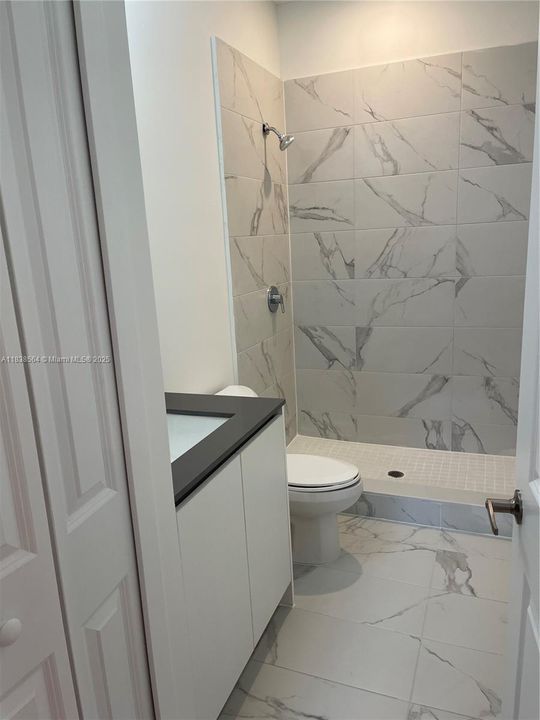 Shared upstairs bathroom with shower only