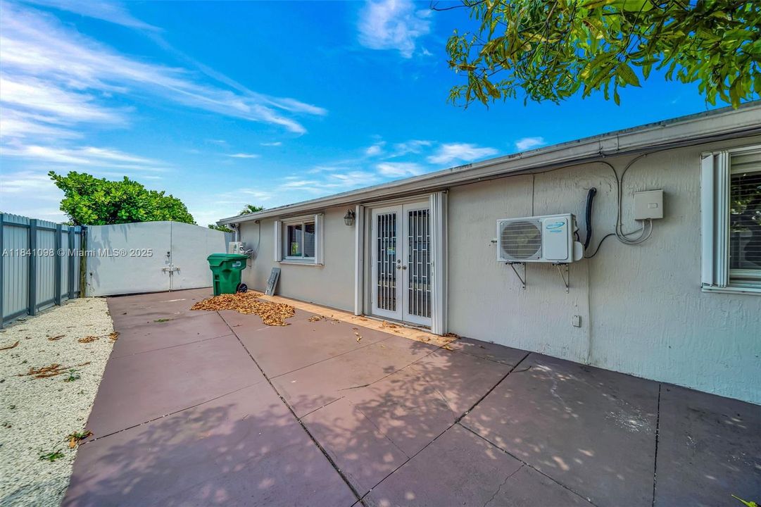 Spacious, stained concrete patio just off the kitchen and family/dining area.