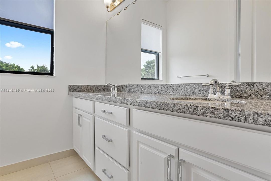 Shared Bathroom with Double Basins