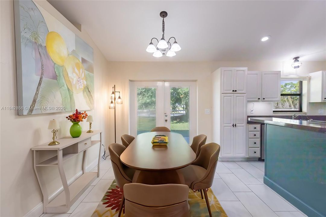 Dining room opens to the backyard