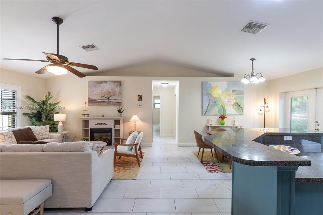 The hallway leads to the 2 guest bedrooms and the guest bathroom with a tub.