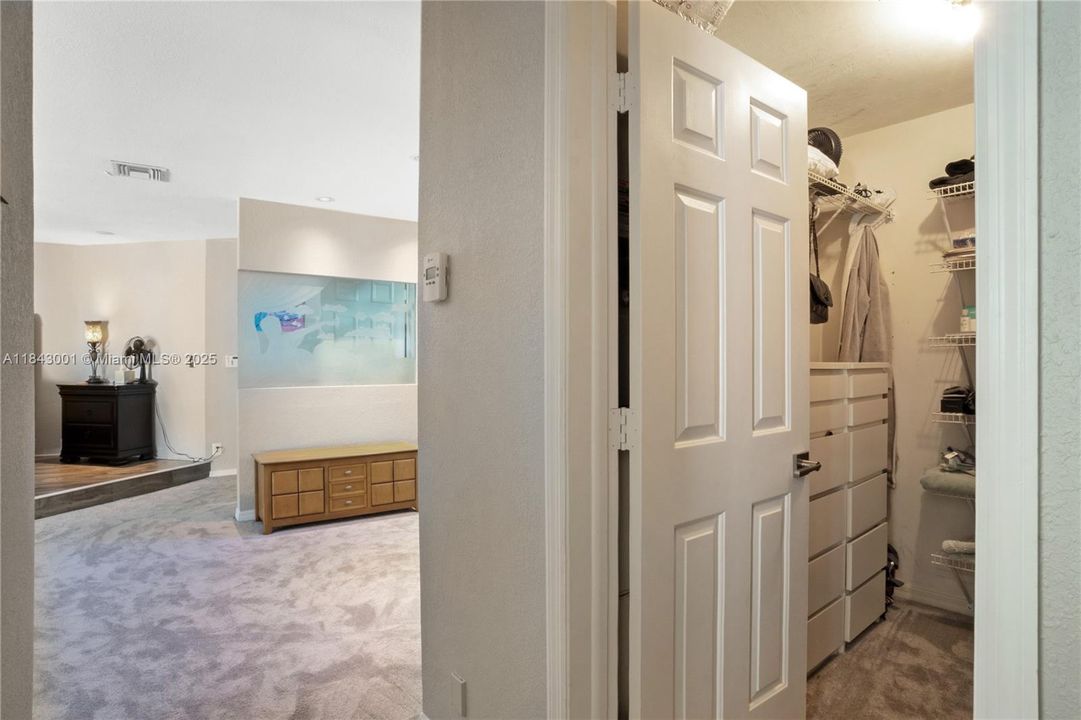 2 large walk in closets with built in cabinets