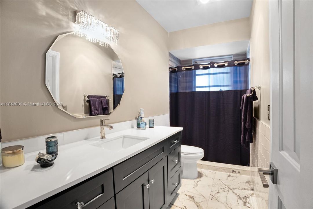 3rd cabana bath with exterior door to pool