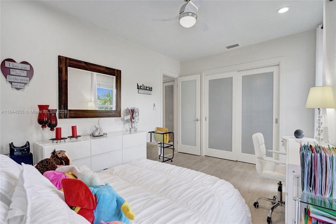 4th bedroom with recently built-in new closets from wall to wall