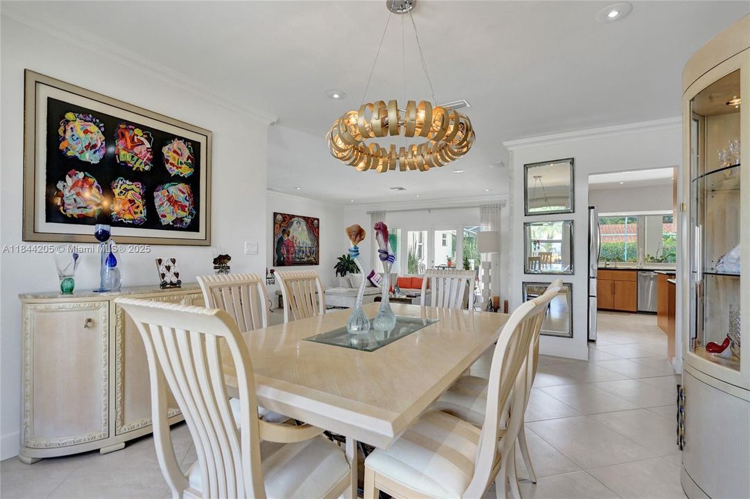 Plenty of dining room space for credenza, table and chairs and even the glass unit!