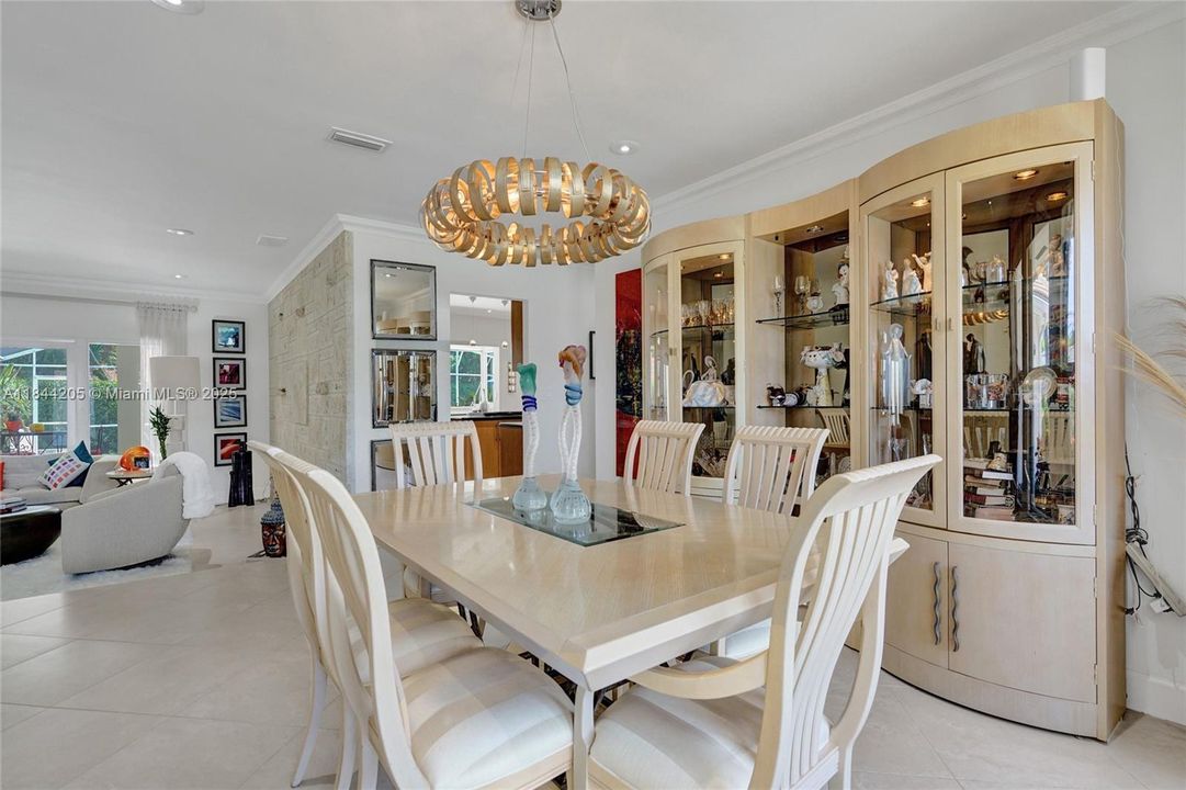 Dining area fits 12 people comfortably!  Open the table and have your holiday parties and dinner guests for entertaining .  Plenty of room to add another long table for even more guests!