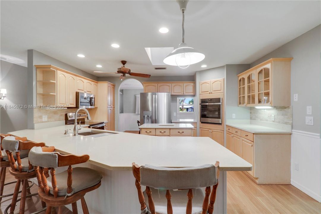 Flex space, 1/2 bath, laundry room and office/stoarge