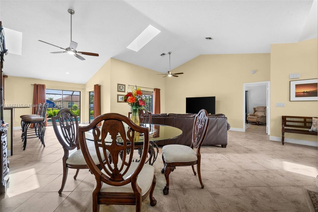 Vaulted ceilings and skylights create a bright and open living space.