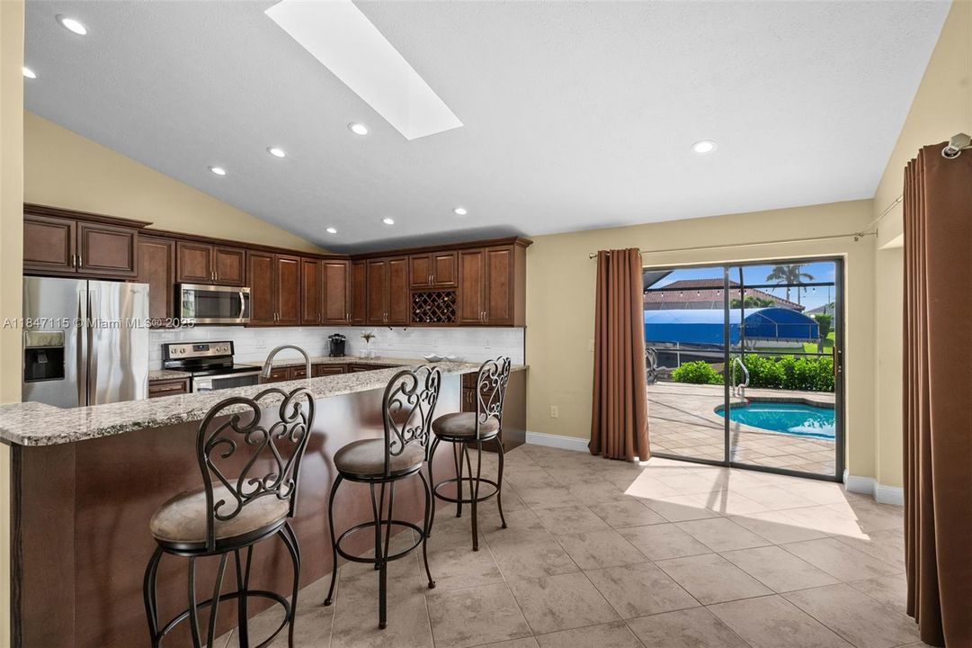 Breakfast bar offers extra seating and a cozy place to gather.