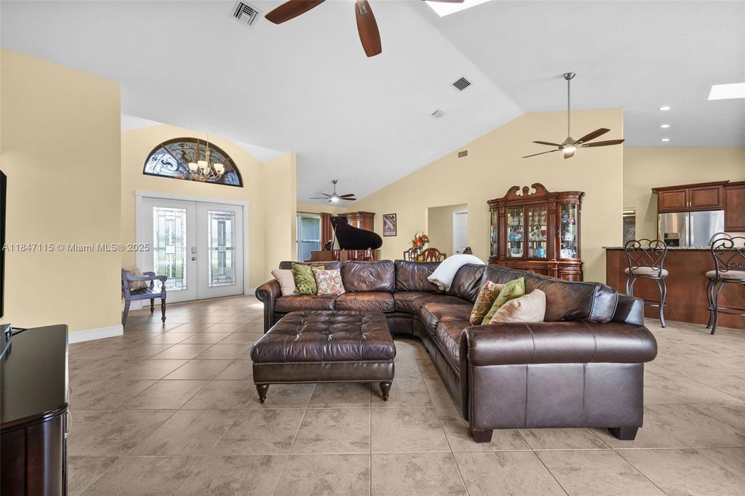 Double glass front doors welcome you inside.