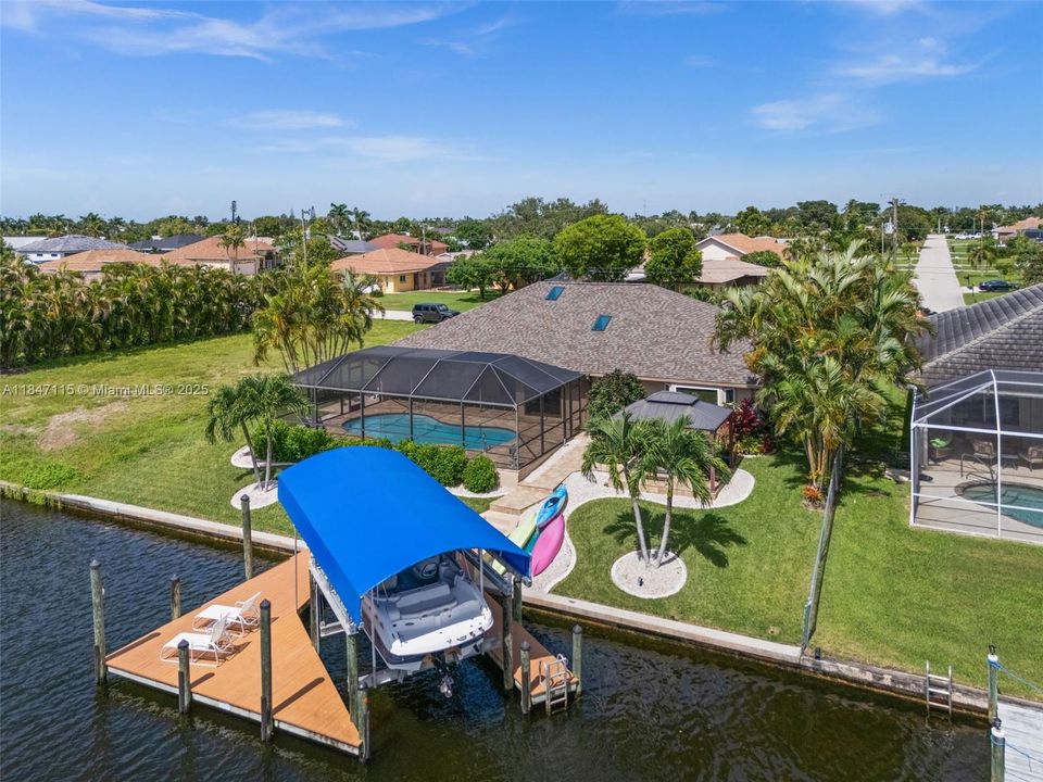 The dock includes a sitting area for enjoying the waterfront.