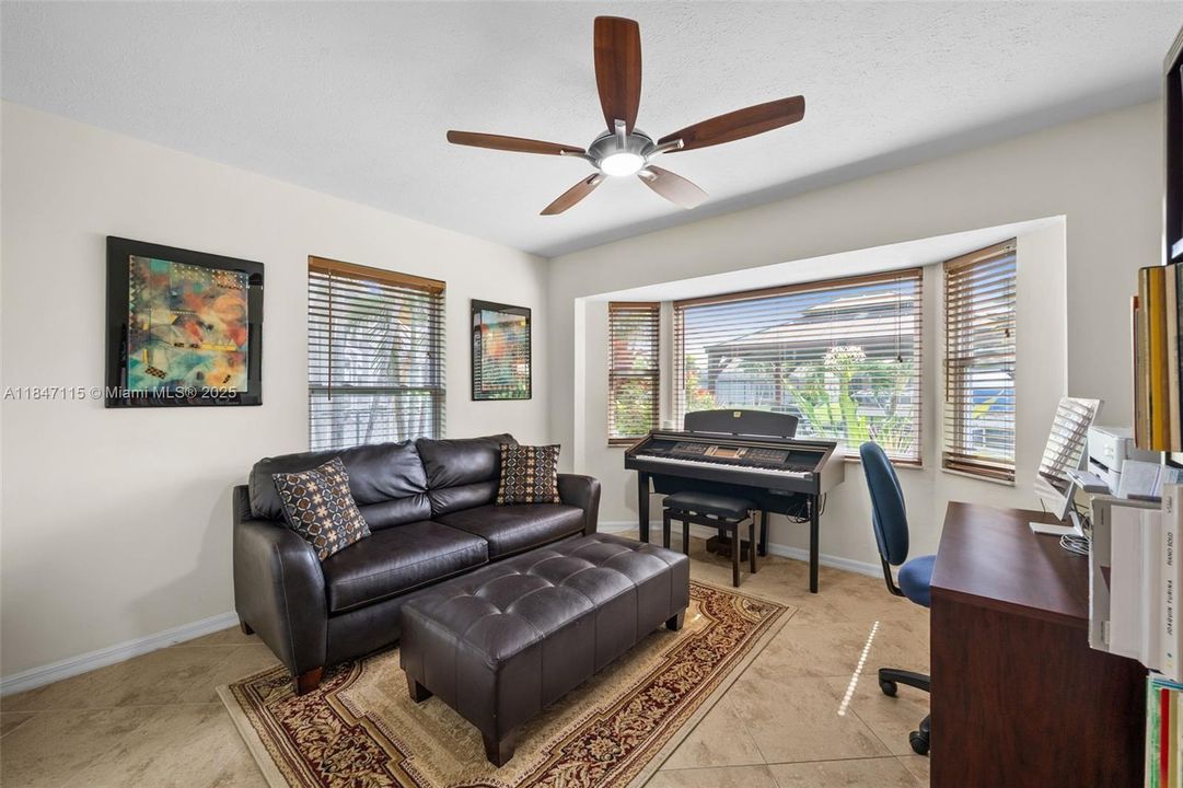Bedroom 2 with its beautiful bay window overlooking the water