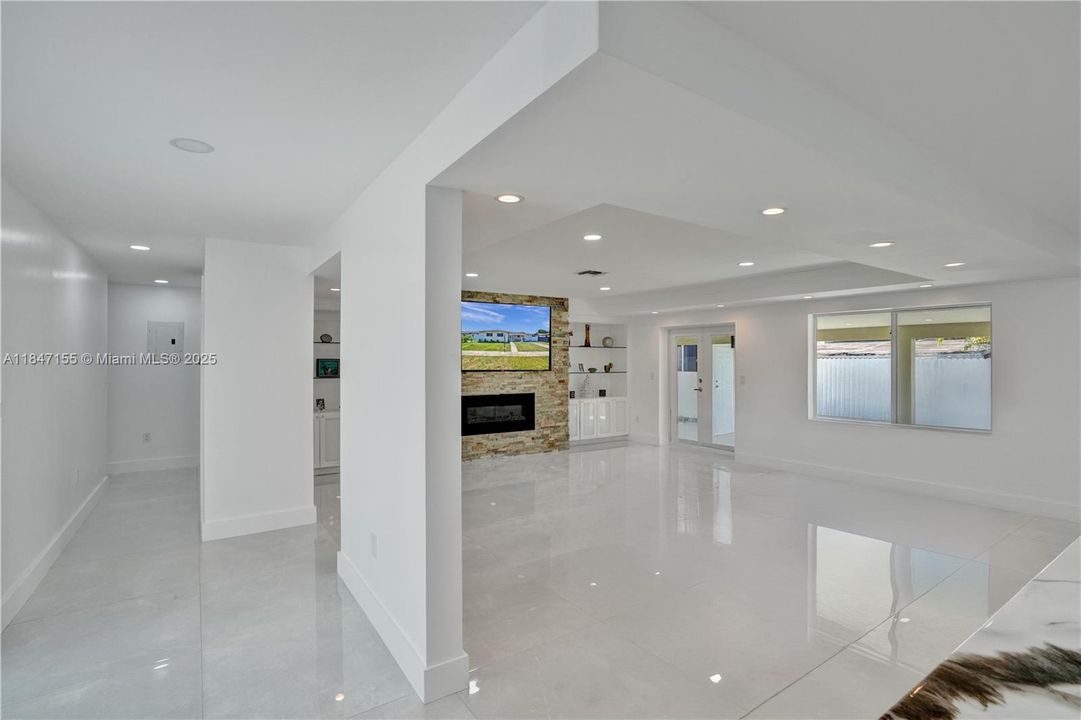 Living room/Dining Area & Kitchen Digitally Cleared for Staging
