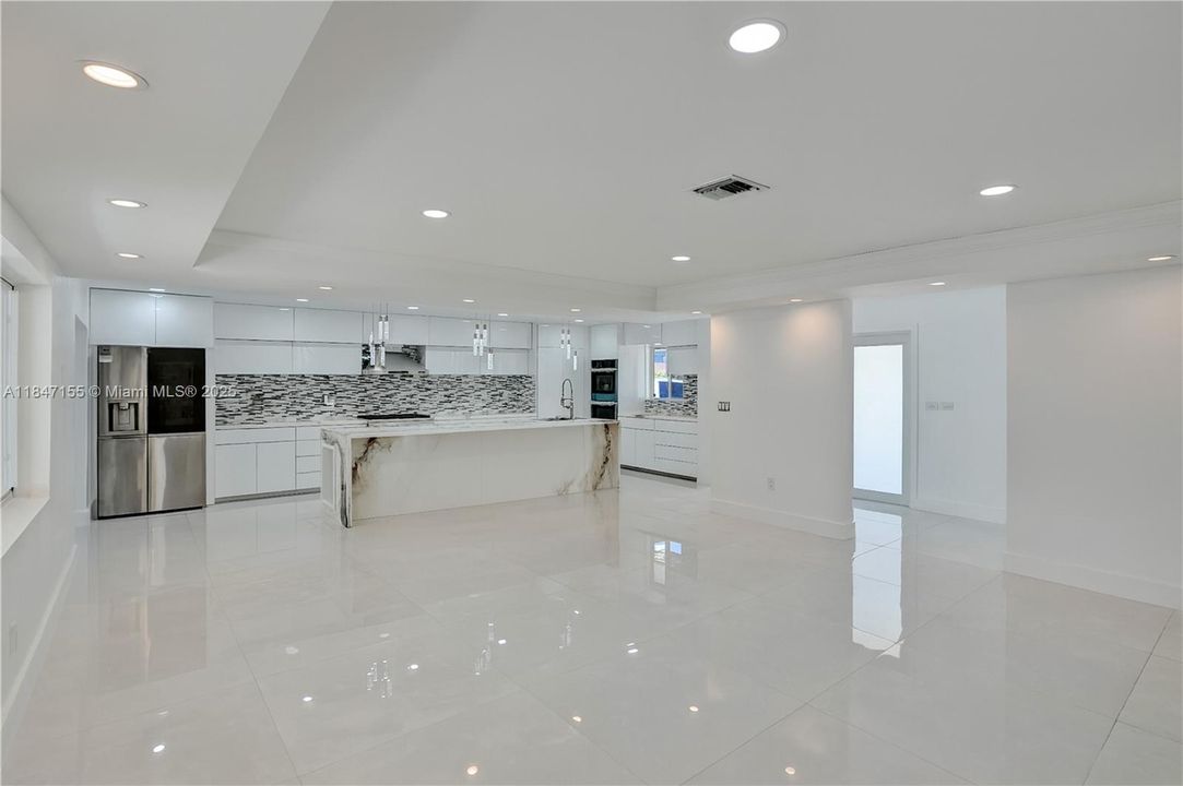 Living room/Dining Area & Kitchen Digitally Cleared for Staging