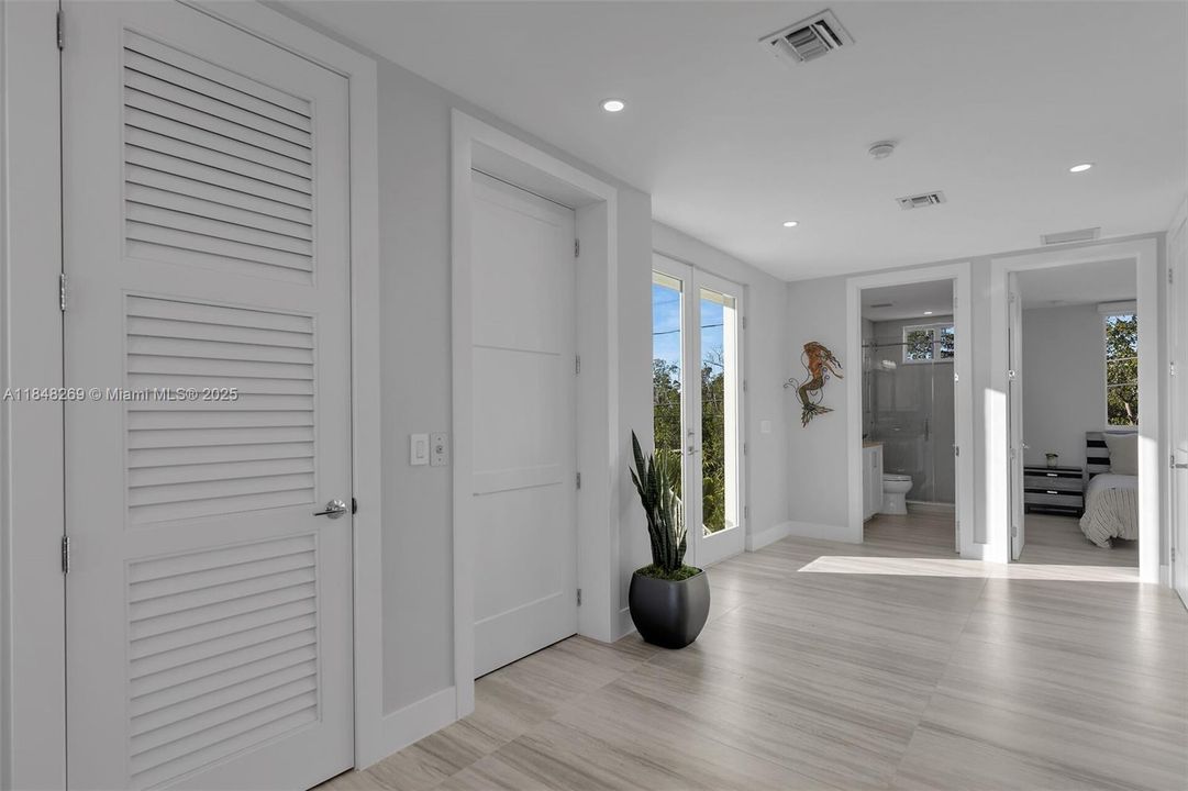 Main level entry door, elevator and main floor bedroom & full bath