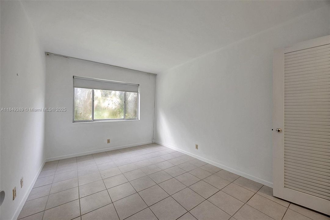 2nd bedroom with walk in closet