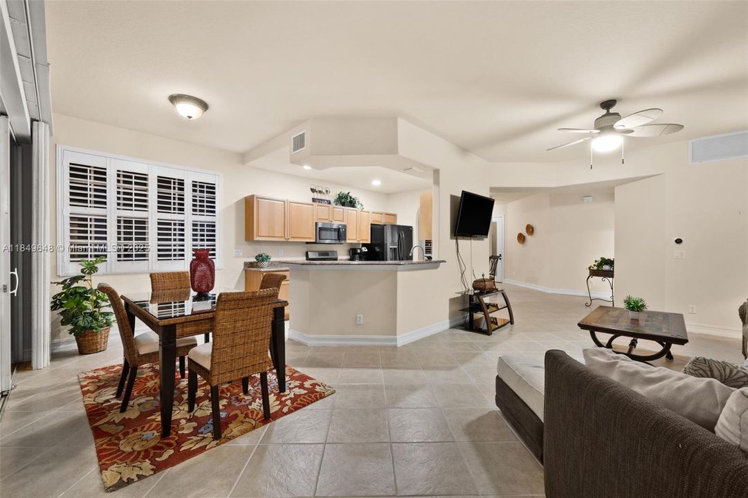 Evening View of the Living Room and Kitchen