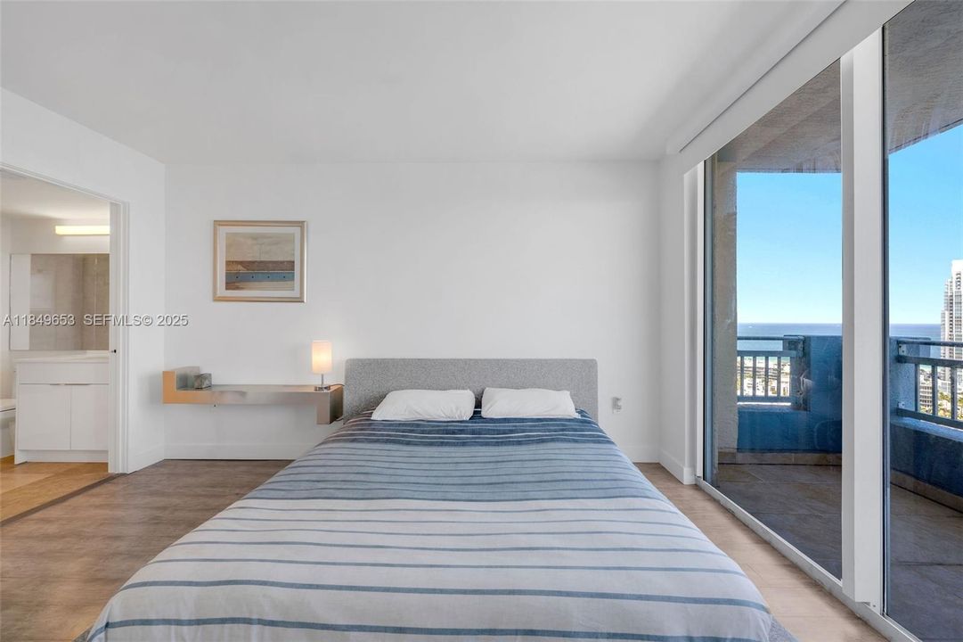 Bedroom with south and east facing balcony