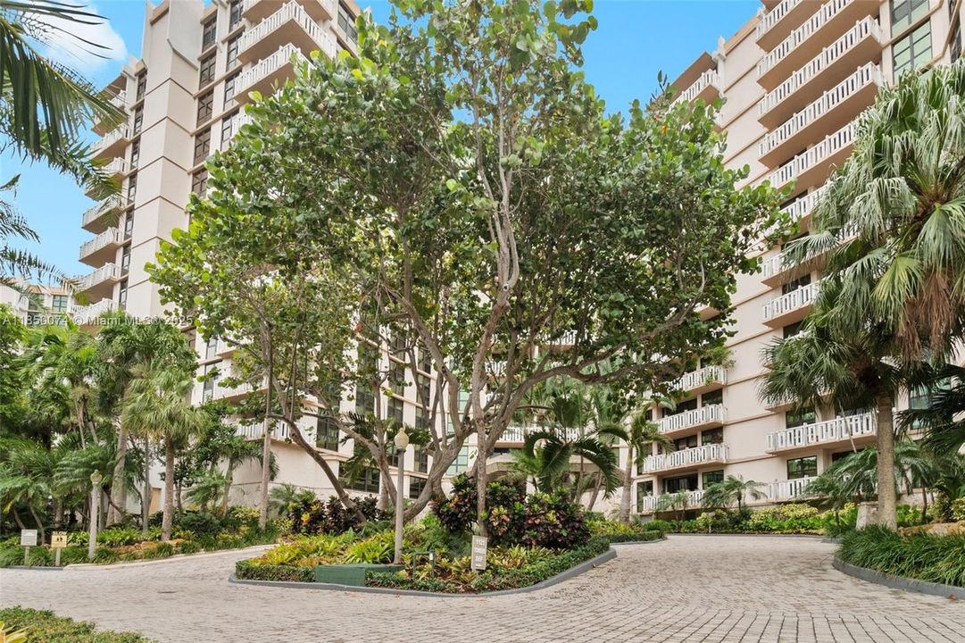 Find main entrance of the building after private gate.