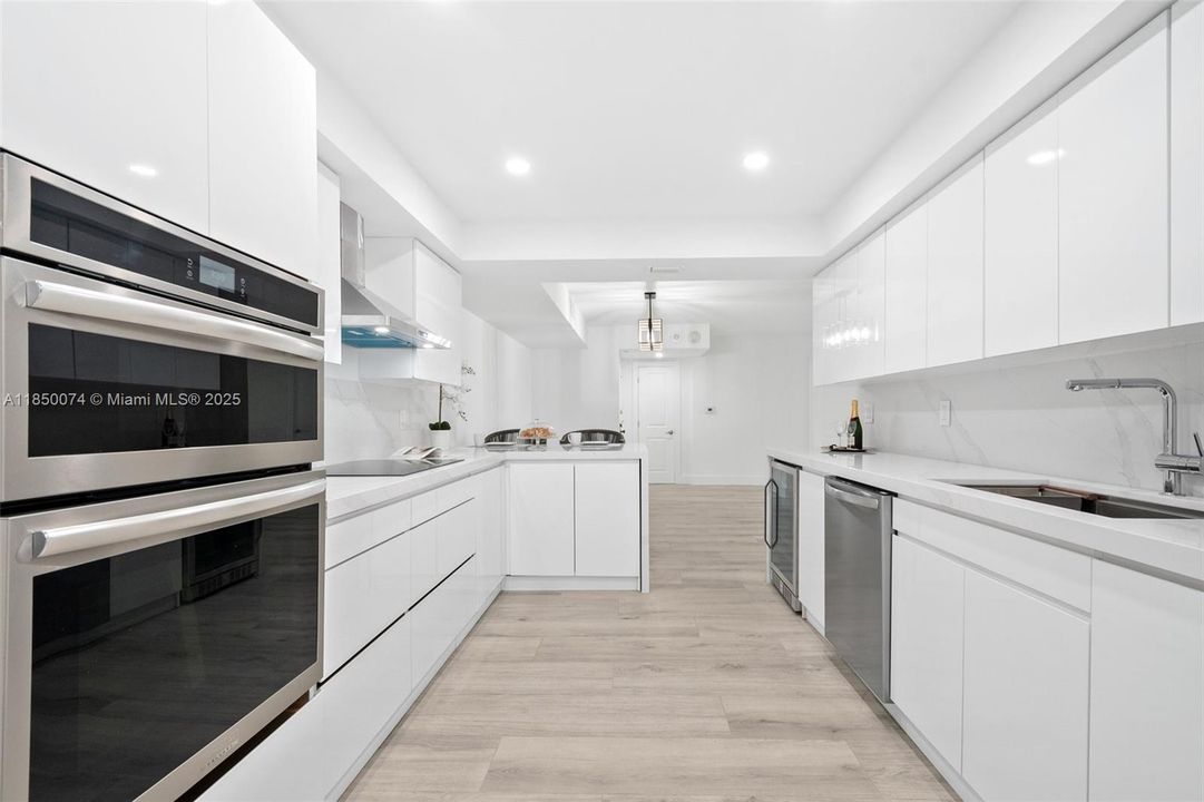 Features brand new convection wall oven and microwave.